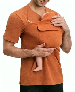 Close-up of men orange kangaroo dad t-shirt with front baby pouch pocket for carrying.