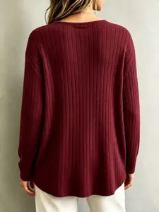Detailed back view of a casual solid color long sleeve V-neck ribbed knit sweater top.
