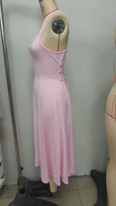 Summer casual pink solid color strap maxi dress with lace-up waist and pocket details.
