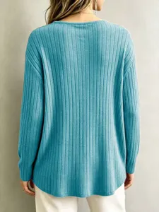 Detailed view of casual long-sleeve ribbed knit top, soft texture, comfortable fit back style.