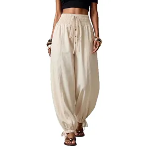 Beige Damen Freizeithose mit hoher Taille, lockere Baggy Hose mit Kordelzug und Gummibund.