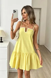 Elegant yellow spaghetti strap mini dress with white scalloped V-neck for summer days.