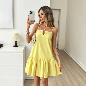 Women's elegant yellow spaghetti strap ruffled mini dress for spring and summer casual wear.