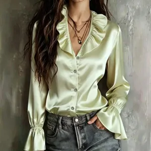 Elegant satin V-neck blouse featuring ruffles and bell sleeves, chic women's button-up shirt.