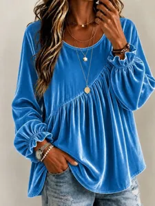 Detailed view of women velvet long sleeve blouse, casual crew neck irregular pleated design.