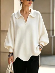 Detailed view of the women's white lapel V-neck lantern sleeve knit sweater, relaxed fit.