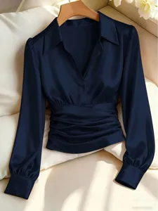 Dark blue satin long sleeve blouse with lapel collar, V-neck and stylish ruched waist design.
