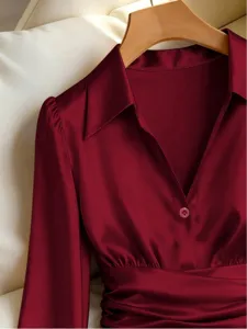 Wine red satin lapel long sleeve blouse detail, elegant v-neck pleated waist top.