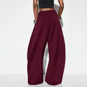 Pantalon sarouel large rouge vin taille haute pour femme vue arrière style mode décontractée
