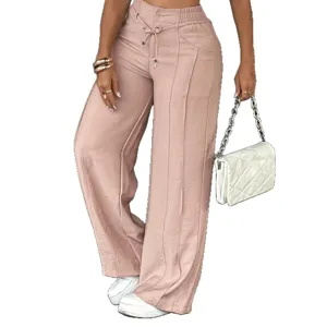 Women high waist pink wide leg pants casual draping trousers with drawstring and pockets.