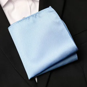 Light blue men's pocket square detail, classic striped suit handkerchief for formal wear.