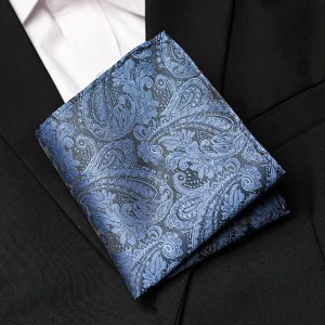 Close-up detail of blue paisley pocket square for men suit tuxedo handkerchief accessory.