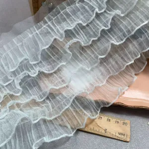 White layered ruffled mesh lace trim for princess dress cuffs, curtains, and DIY crafts.