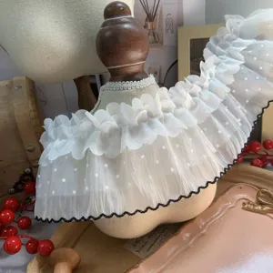 Close-up detail of 10cm double-layer polka dot lace trim for doll dress DIY crafts.