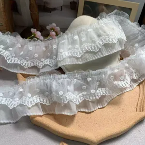 White double-layer tulle lace trim detail shot, delicate embroidery texture for DIY craft.