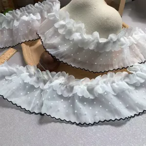 Detailed view of 10cm wide white double layer dotted ruffle lace trim for diy sewing crafts.