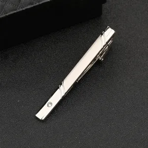 Elegant silver metal tie clip for men, featuring minimalist lines and a sparkling crystal.