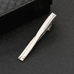 Silver metal tie clip detail view, minimalist design for business formal wear and suits.
