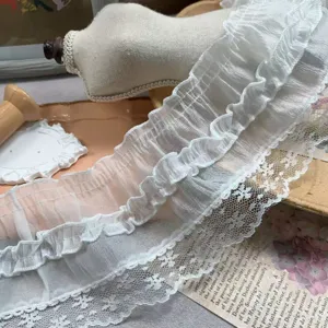 Close-up of 9cm wide white chiffon pleated lace trim, perfect for DIY crafts and doll clothes.