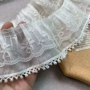 Detail shot of 7cm wide double layer white chiffon pearl lace trim for diy sewing clothing cuffs.