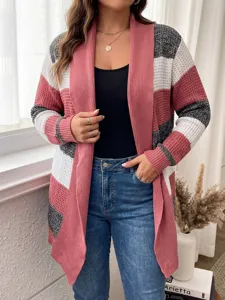 Detailed view of the color-block knit cardigan featuring striped patterns and open-front design.