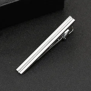 Minimalist silver metal tie clip for men, classic business suit accessory, elegant necktie pin.