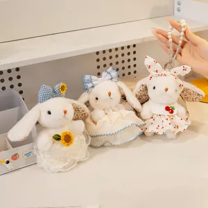 Cute plush rabbit bag charm with flower dress and pearl chain, sweet rabbit keychain doll.