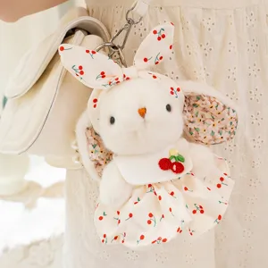 Adorable plush rabbit pendant keychain featuring a sweet cherry print dress, soft toy bag charm