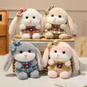 Cute plush rabbit keychain with floral dress and bow, soft bag pendant for girls and kids.