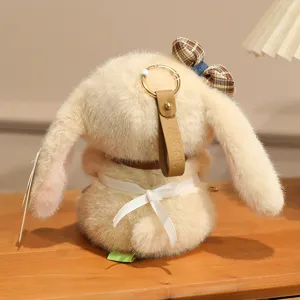 Cute plush rabbit keychain and fluffy bag pendant, soft stuffed animal doll with bowknot.