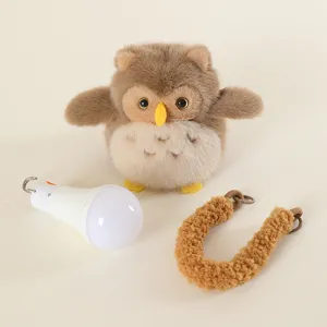 Cute owl plush night light with hanging bulb and strap for dorm bedroom bedside decor.
