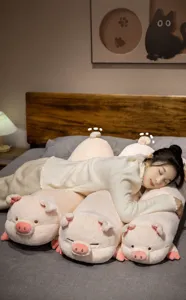 Cozy pink pig long bolster pillow scene detail showing soft plush fabric and comfortable sleeping.