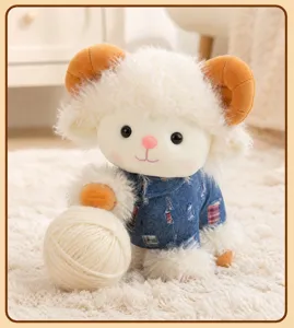 Cute curly sheep plush toy detail, soft lamb doll wearing denim outfit with yarn ball.