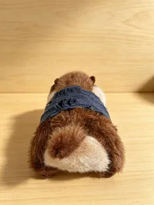 Cute plush beaver marmot doll detail view, soft stuffed animal toy with funny design, perfect gift.