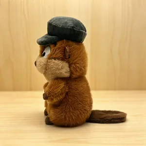 Cute beaver plush toy side view, adorable stuffed animal wearing a cute grey cap.