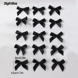 Black ribbon bow hair clips detail view showing size and weight specs for sweet styling.