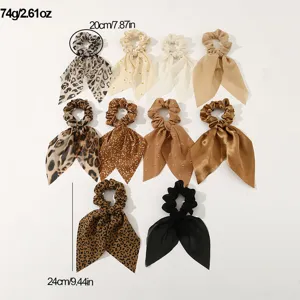 Set of 10 brown satin and chiffon hair scrunchies with long ribbon tails, elegant design.