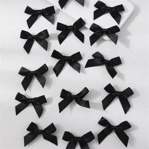Chic black satin hair bows set, versatile polyester ribbon mini bow clips for sweet daily looks.