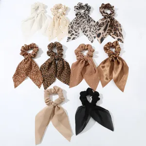 Set of 10 satin and chiffon hair scrunchies with long ribbon tails for women daily styling.