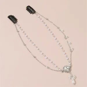 Detailed view of vintage crystal forehead chain with pearls and waterdrop pendant for Hanfu style.