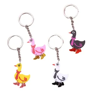 Ensemble de porte-clés canard mignon, anneaux en métal avec pendentifs colorés.