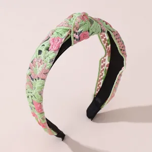 Floral lace embroidered wide headband, green and pink knotted hair hoop accessory.