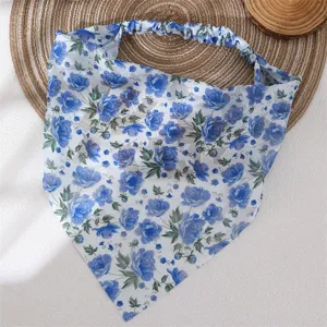 Blue floral chiffon hair scarf detail, elegant triangular bandana design with elastic back band.