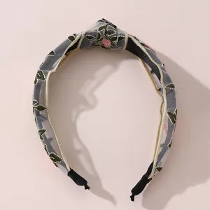 Floral embroidered mesh knotted headband for women, wide brim chic hair accessory for daily wear.
