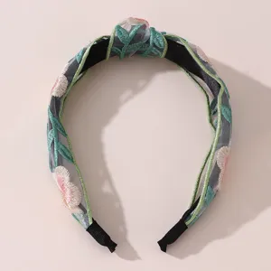 Exquisite floral embroidered mesh knotted headband, elegant hair accessory for women daily wear.