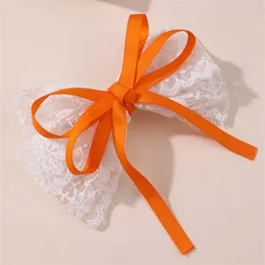 Dulce pinza de pelo con lazo de cinta naranja y encaje blanco, accesorio lindo para niñas.