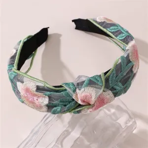 Chic embroidered floral headband for women, wide brim Chinese style hair hoop accessory.