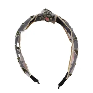 Chic mesh knotted headband for women, stylish floral embroidered wide hair hoop accessories.