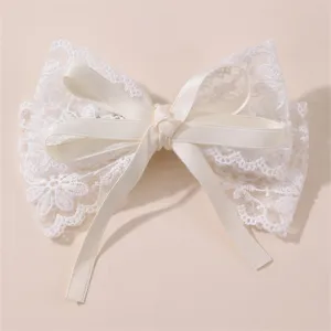 Detalle de lazo de encaje blanco, pinza de pelo dulce con cinta para niñas y estudiantes, accesorio.