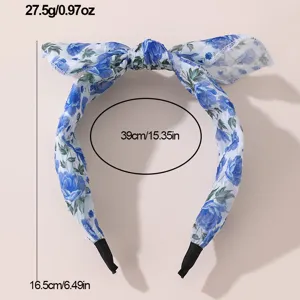 Blue floral chiffon bow headband hair accessory, elegant spring clip for women styling.